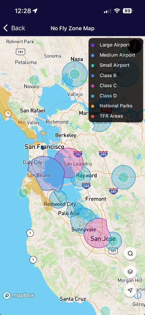 Drone Buddy no-fly zone map over the San Francisco Bay Area showing Class B, C, and D airspace polygons, airports, and TFRs